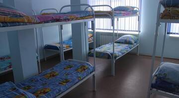 Фото номера Односпальная кровать в общем номере с 10 кроватями Гостиница Олимп г. Бор 6